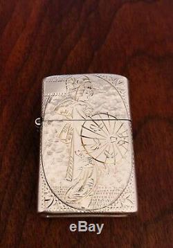 - Japanese Sterling Silver Cigarette Lighter Engraved Design Of Geisha