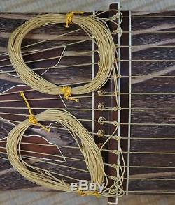Koto harp Japan string instrument 1980s Japanese music hand craft