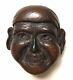 Meiji Era, Wooden Japanese Netsuke Mask (Mennetsuke) Wearing a Hachimaki -Patina